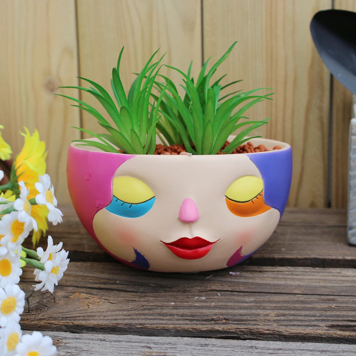 Bunter Harz Blumentopf – Modernes Gesicht Design Desktop