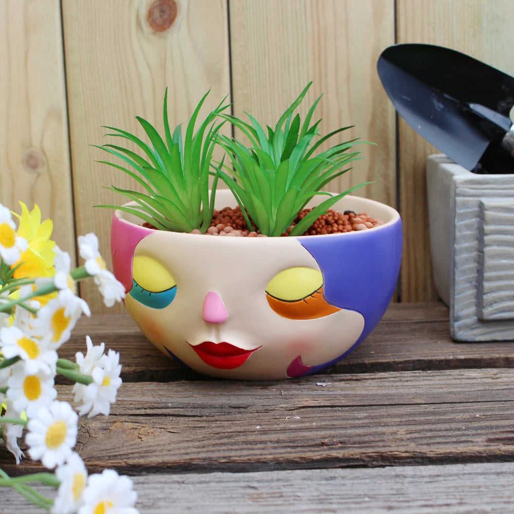 Bunter Harz Blumentopf – Modernes Gesicht Design Desktop