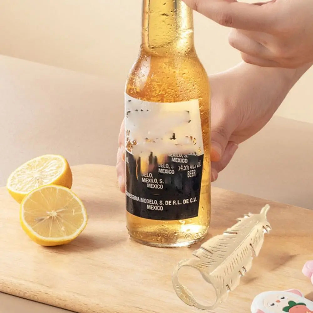 Goldener Flaschenöffner – Federdesign 10x4.2cm