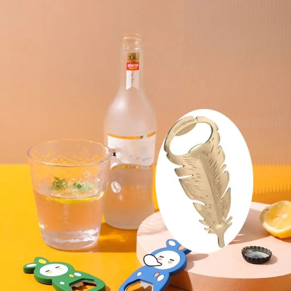 Goldener Flaschenöffner – Federdesign 10x4.2cm