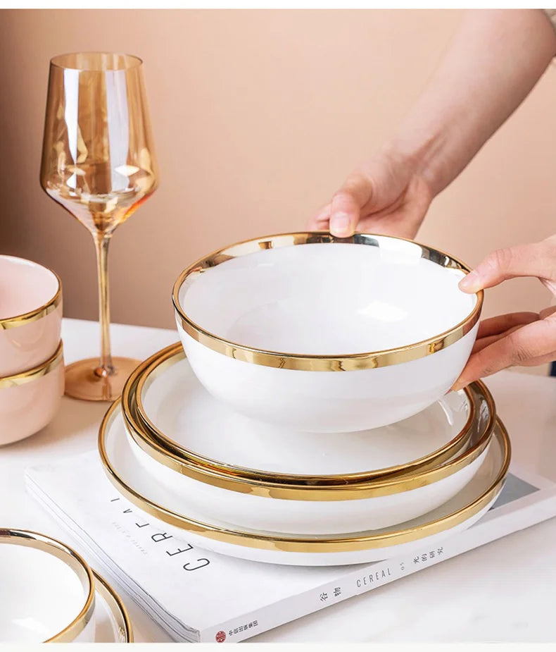 weisses keramik geschirr-set mit eleganten goldrand-verzierungen, verschiedene grösse-varianten