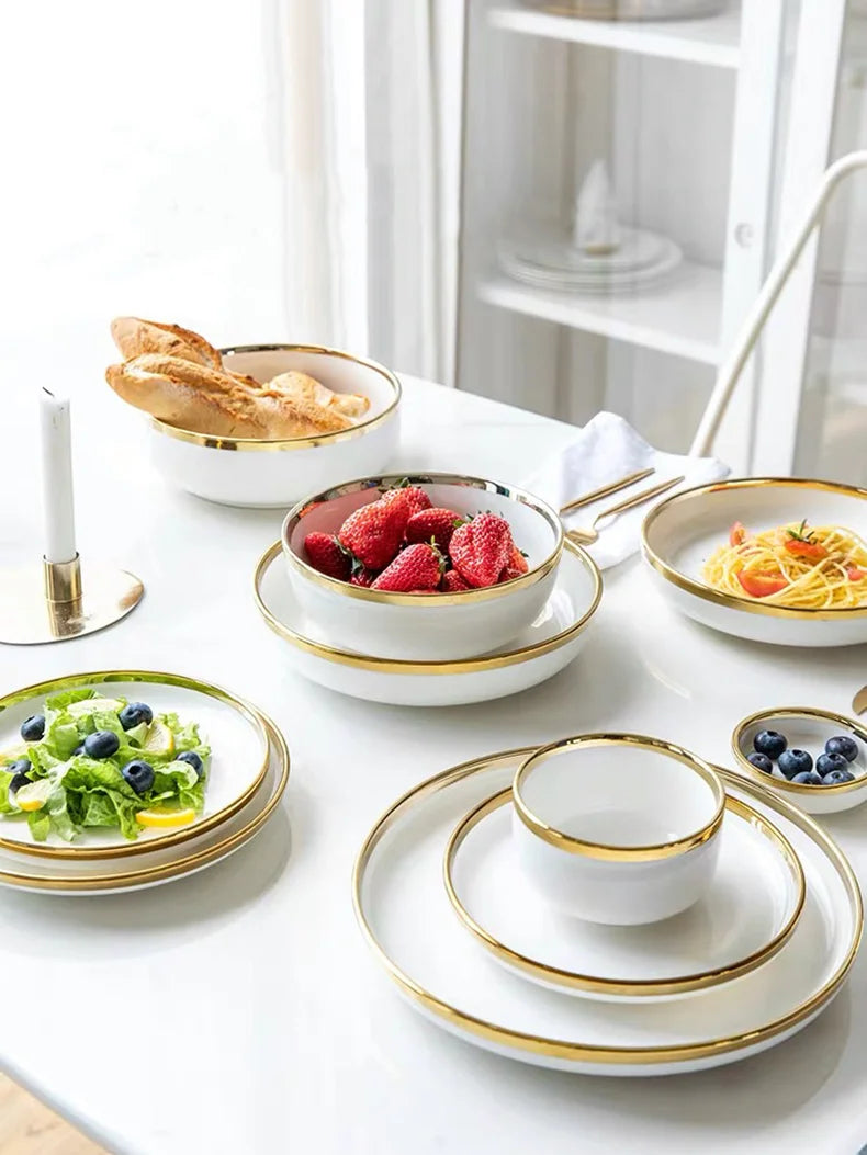 Elegantes keramikgeschirr set weiss mit goldrand für esstisch