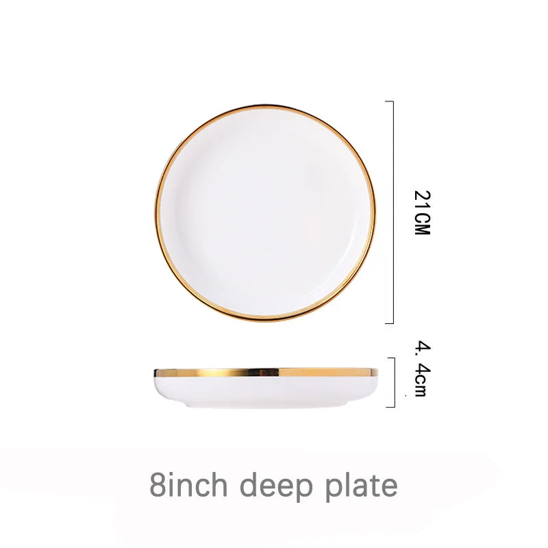 Elegantes weisses Keramik-Geschirr mit Goldrand für Esstisch
