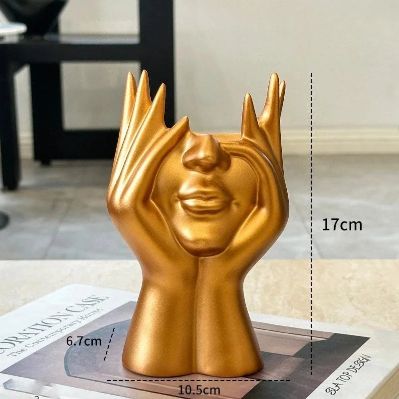 Nordischer Kunststoff-Pinselhalter mit abstraktem Gesicht in Schwarz und Gold