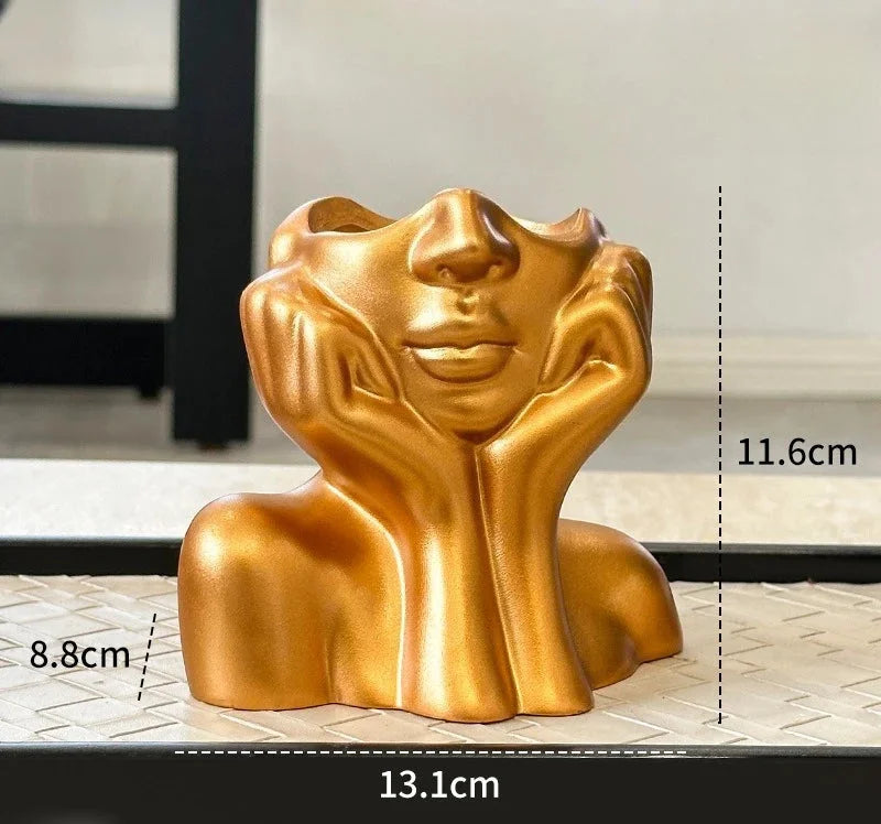 Nordic Face Pinselhalter in Schwarz mit abstraktem Gesicht aus Kunststoff